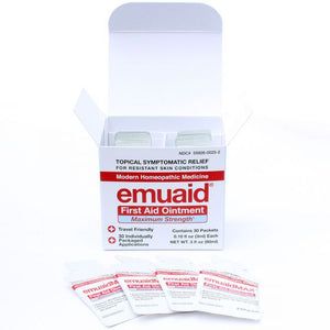 Voici la photo d'une boîte de voyage ouverte EMUAIDMAX® First Aid Ointment 30 Days.
